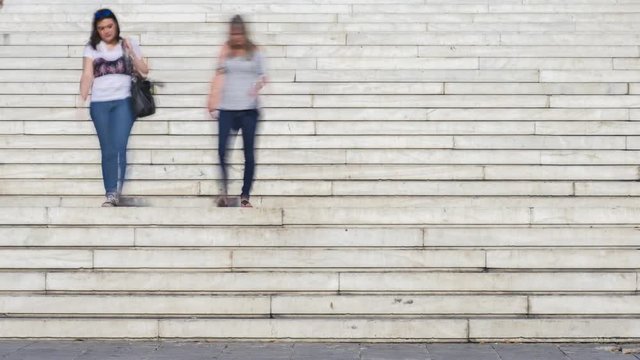 4K timelapse of people walking up and down the steps