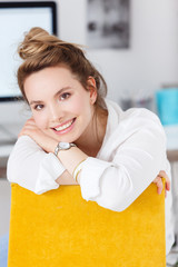 Portrait of modern young stylish charming woman office or remote worker on background of  blurred office desk