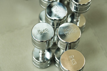 Closeup image of chrome dumbbells