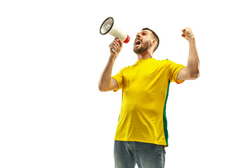 Fototapeta Brazilian fan celebrating on white background obraz