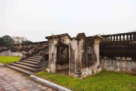 Hue, Vietnam. Old ruins left from buildings of the royal city at the garden inside of Imperial Forbidden city complex in Citadel.