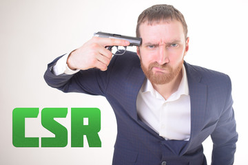 The businessman holds a gun in his hand and shows the inscription:CSR