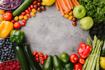Different tasty vegetables on rough background