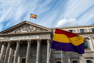 Facade of the Congress of Deputies in Madrid, Spain, with Republican and Spanish flags waiving