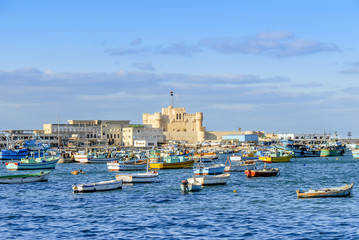 Alexandria, Egypt, 21 February 2018: Qaitbay Citadel and sandals