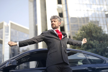 Businessman stretching after a long journey