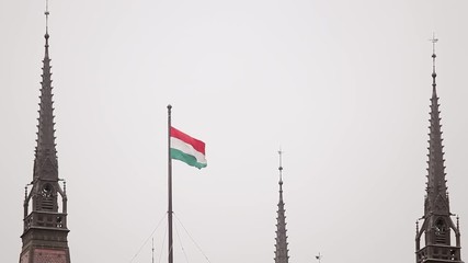 View of Flag of Hungary at the Hungarian Parliament Building in Budapest, Hungary