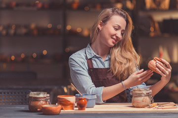 Young girl in a pottery studio
