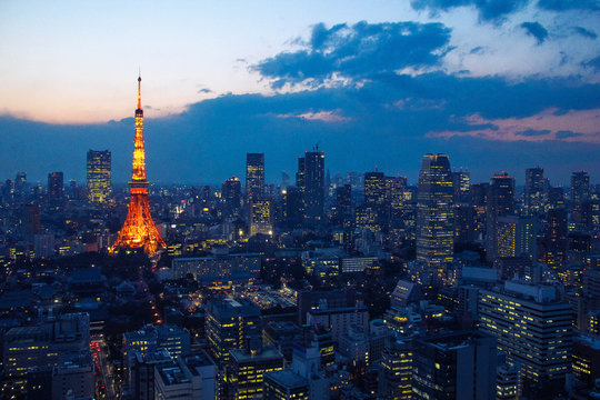 Aerial view over Tokyo tower and Tokyo cityscape with high rise architecture at sunset in Tokyo, Japan