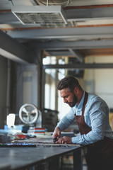 Young master in workshop