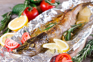 Baked fish with lemon and rosemary
