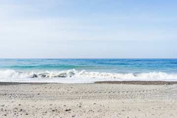 Beautiful empty pebbles beach - serenity and peace in the journey. 