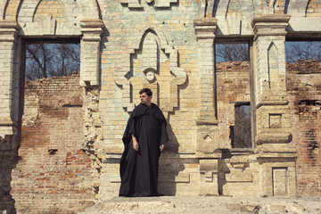 A lonely monk in an abandoned old castle