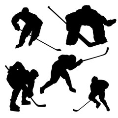 Raster set of hockey players silhouettes on a white background