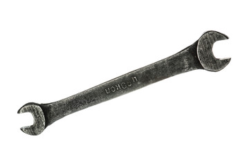 Old grungy wrench on white background. Isolated image of antiquare spanner.