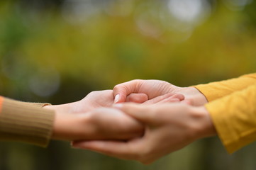 two people  holding