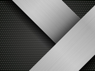 brushed metal plate on perforated background