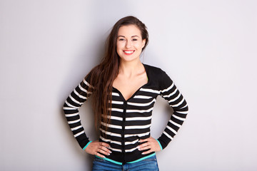 smiling young woman in striped sweater