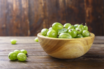 gooseberries on a wooden background