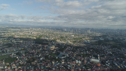 Fototapeta na wymiar Aerial view of Manila city with skyscrapers and buildings. Philippines, Luzon. Aerial skyline of Manila.