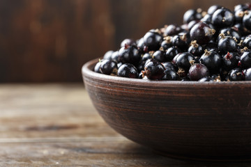 currant on a wooden background