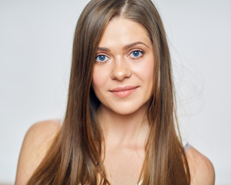 Face close up portrait of beautiful young woman.