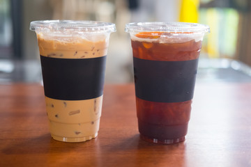 Cup of iced black coffee americano and iced coffee latte