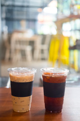 Cup of iced black coffee americano and iced coffee latte