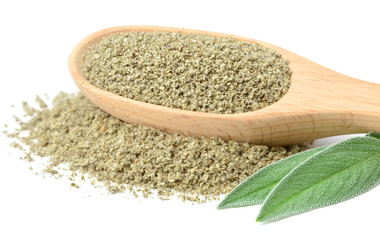 dried salvia in the wooden spoon, isolated on white
