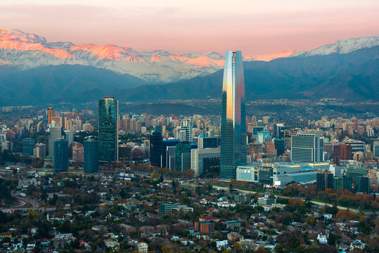 Panoramic view of Providencia and Las Condes districts with The Andes Mountain Range at sunset, Santiago de Chile