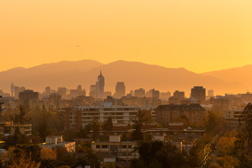 Fototapeta na wymiar Districts of Las Condes, Providencia and Santiago Centro at sunset, Santiago de Chile, South America
