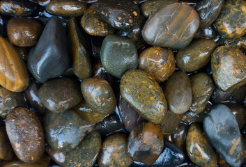 Fototapeta na wymiar Background of river rocks from nature.