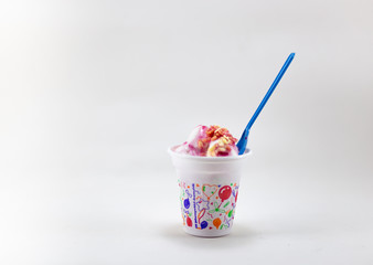 Mixed ice cream in sundae cup on white background isolate