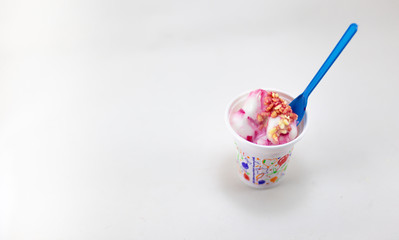 Mixed ice cream in sundae cup on white background isolate