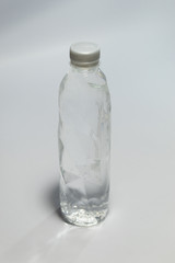 Clean drinking water packaged in clear plastic bottle.