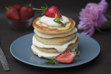 Dessert Pancakes with Cream and Strawbery. Health Breakfast Fruit Berry Vitamine Black Background