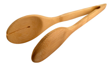 Tongs for mixing food in a salad on a white background.