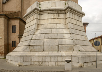 stone pedestal of san Cassiano cathedral bell tower, Comacchio, Italy