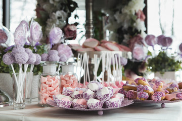 Dessert table for any holiday at wooden background