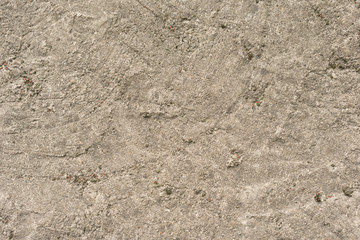 Wall fragment with scratches and cracks
