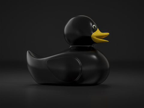 black rubber duck on black background