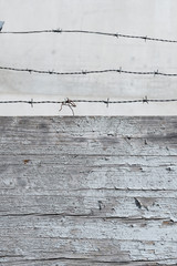 Old weathered wooden wall with barbed wire | 8553