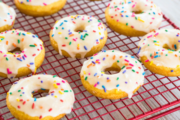 Delicious Cake Donuts On Red Rack