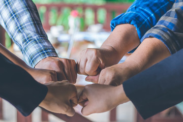 Obraz premium Colleagues hands collaboration making,Business team making concept