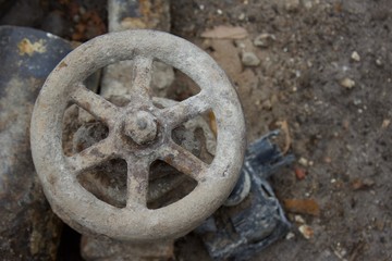 vintage valve on underground pipe