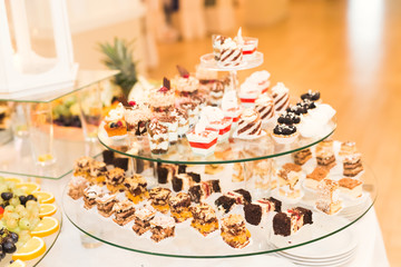 Different kinds of baked sweets on a buffet