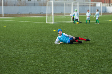 Obraz premium Happy boy football player after goal scored