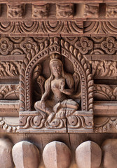 Wooden carving at the column of a hindu temple at Durbar Square in Patan, Kathmandu valley, Nepal