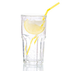 Glass carbonated water with lemon