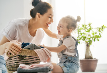 family doing laundry at home